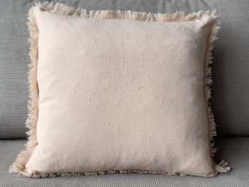 salmon coloured cotton with fringe